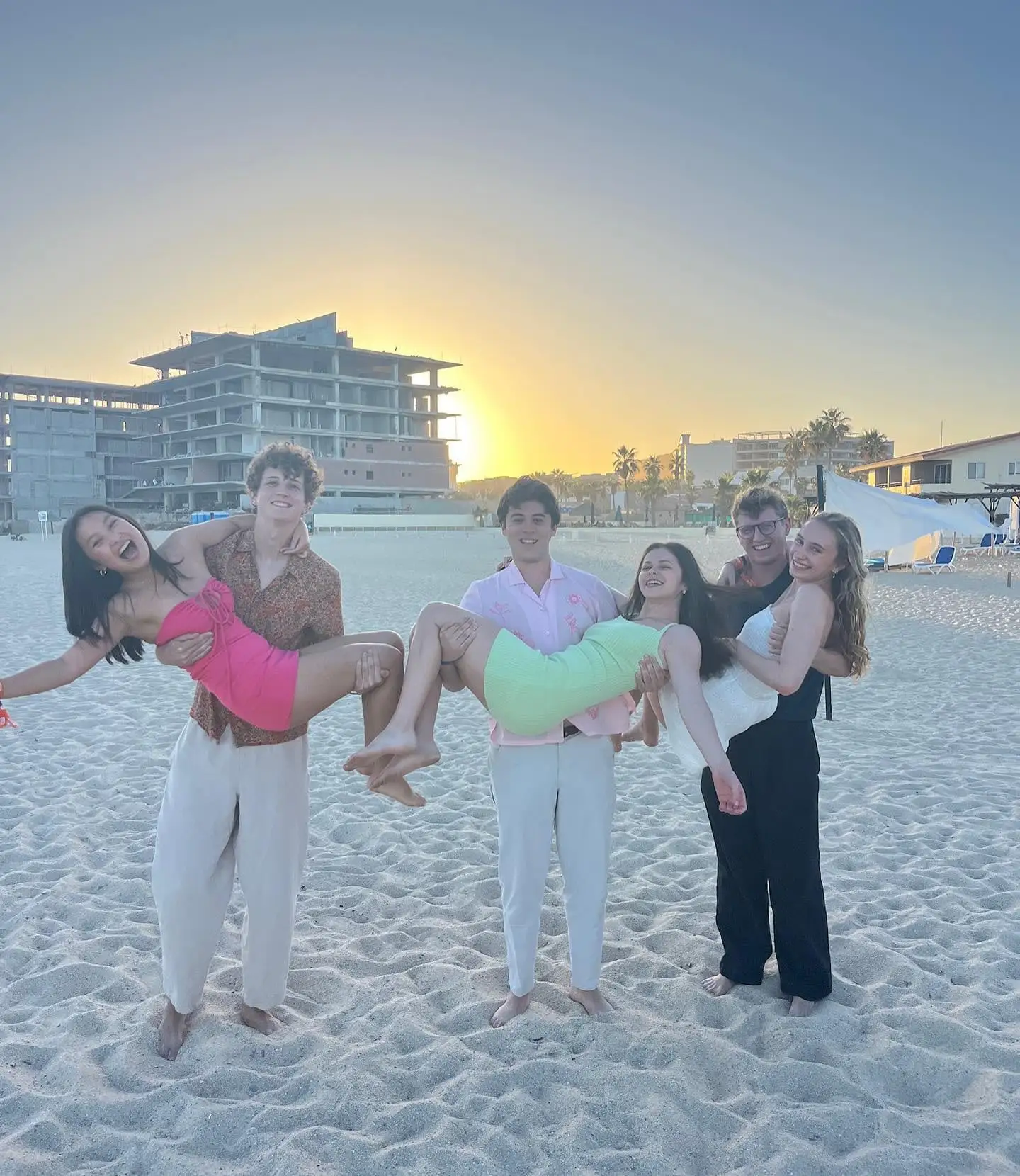 sunset beach carrying poses