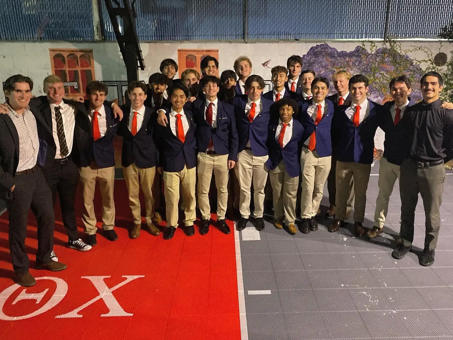 blazers group on red carpet with letters
