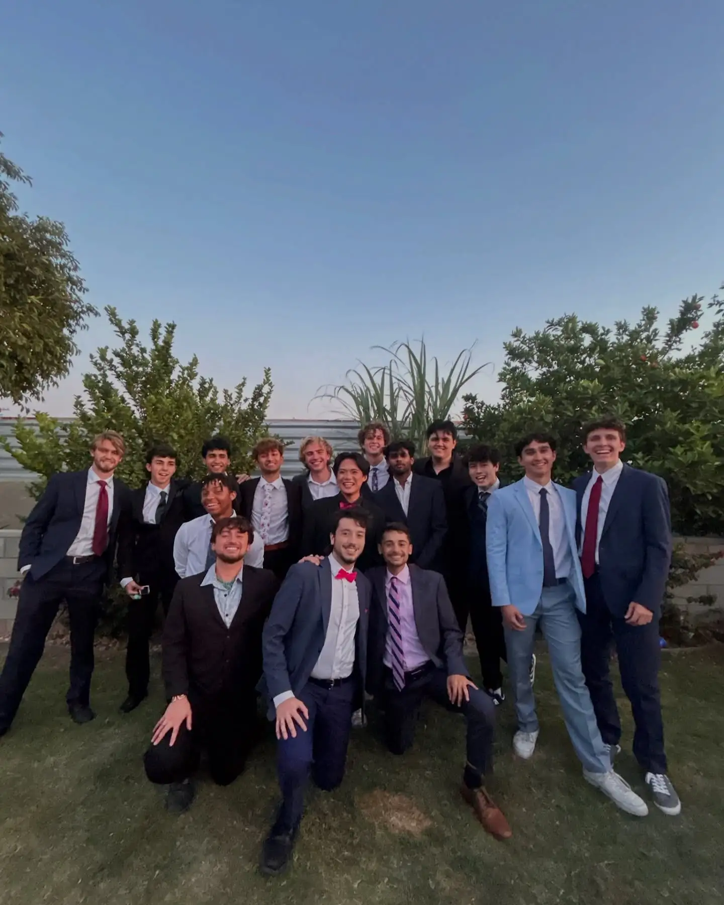 big formal group in suits